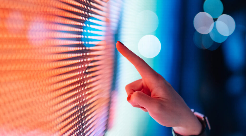 Finger touches a digital surface